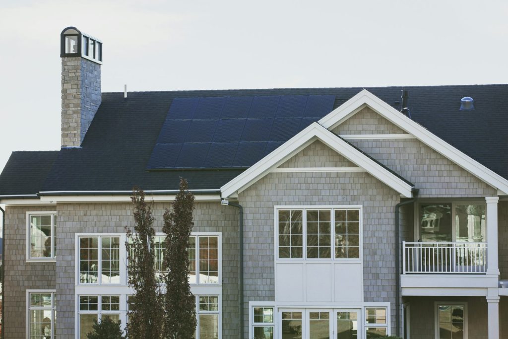 Canadian home with rooftop solar panels and battery storage system